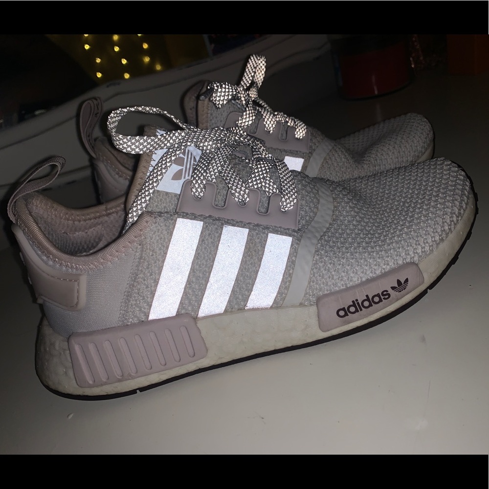 White and pink Adidas NMDs